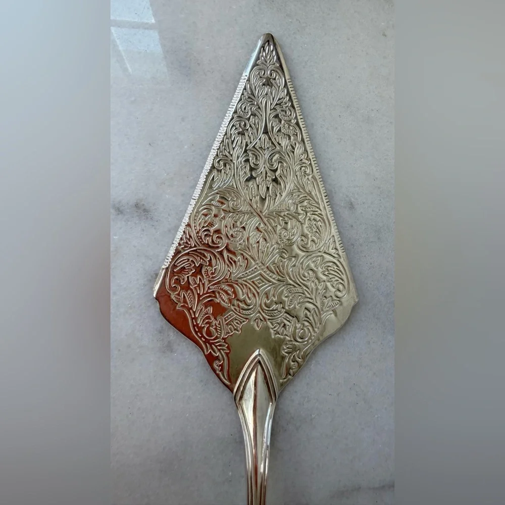 vintage silver-plated pie or cake server, frequently produced in Italy